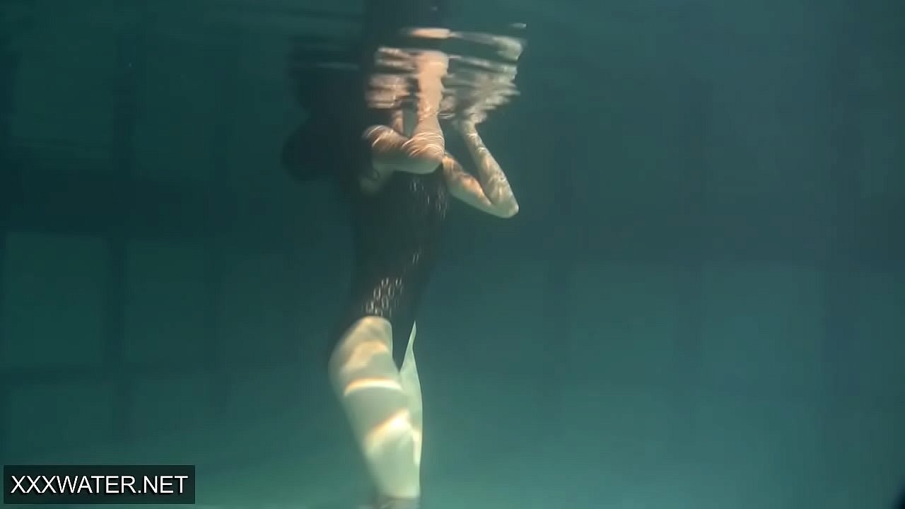Shaved brunette sissy Irina Polcharova naked in the pool