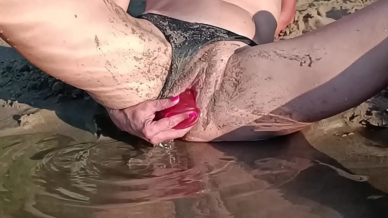 amateur wife use toy on beach