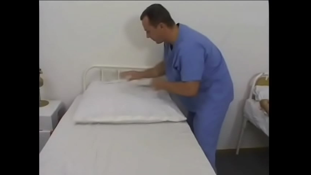 Male intern jacks off while watching female patient play with a dildo then fucks