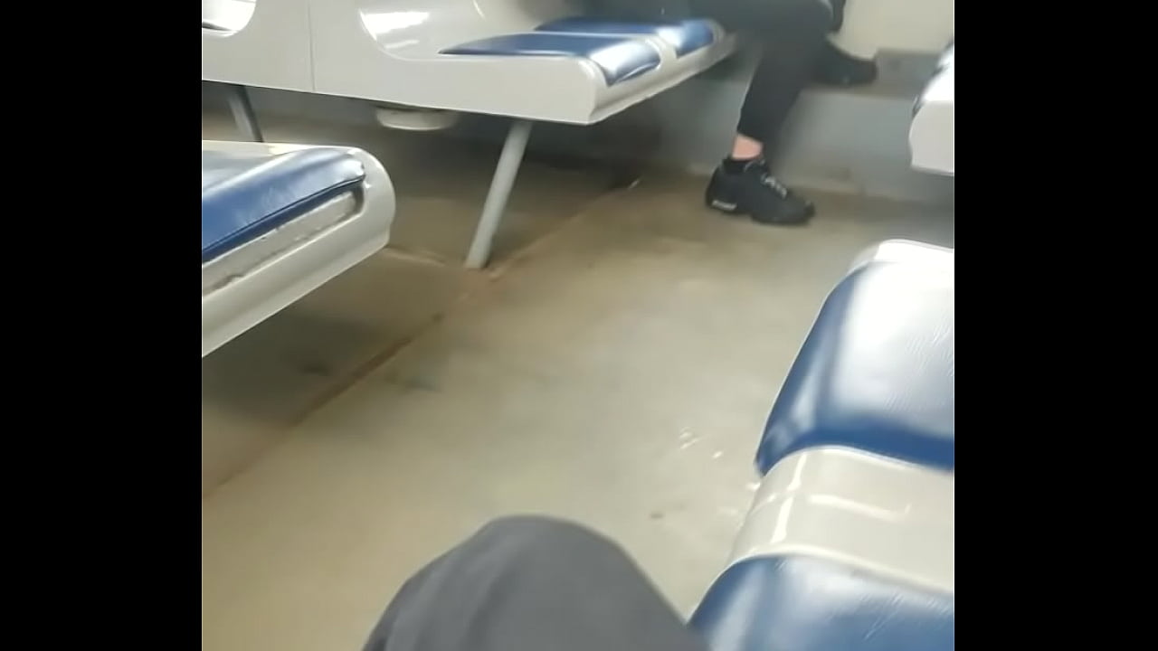 Young guy jerks off in front of another lad in a public train