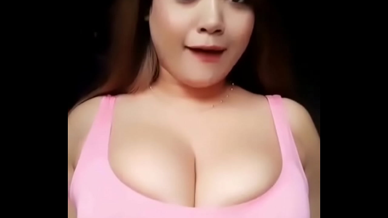 Girl with busty breast dances