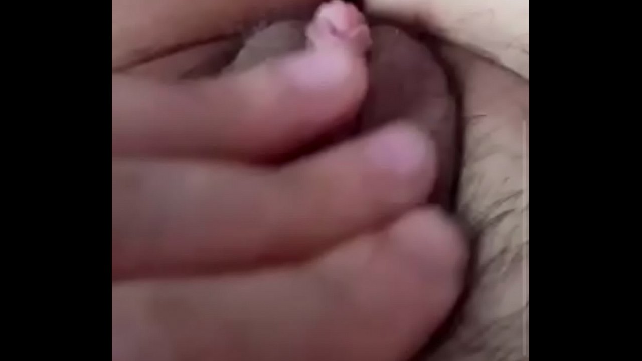 Masturbating