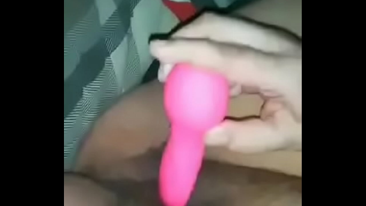 Masturbating with a pink vibrating tongue.
