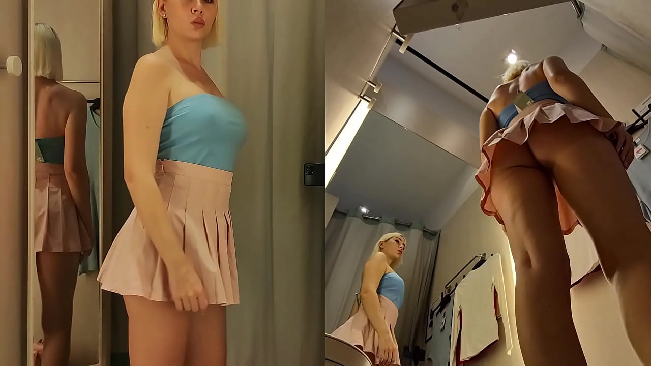 Hidden camera spying on a blonde with a big ass NO PANTY in a public store. Blonde flash big tits