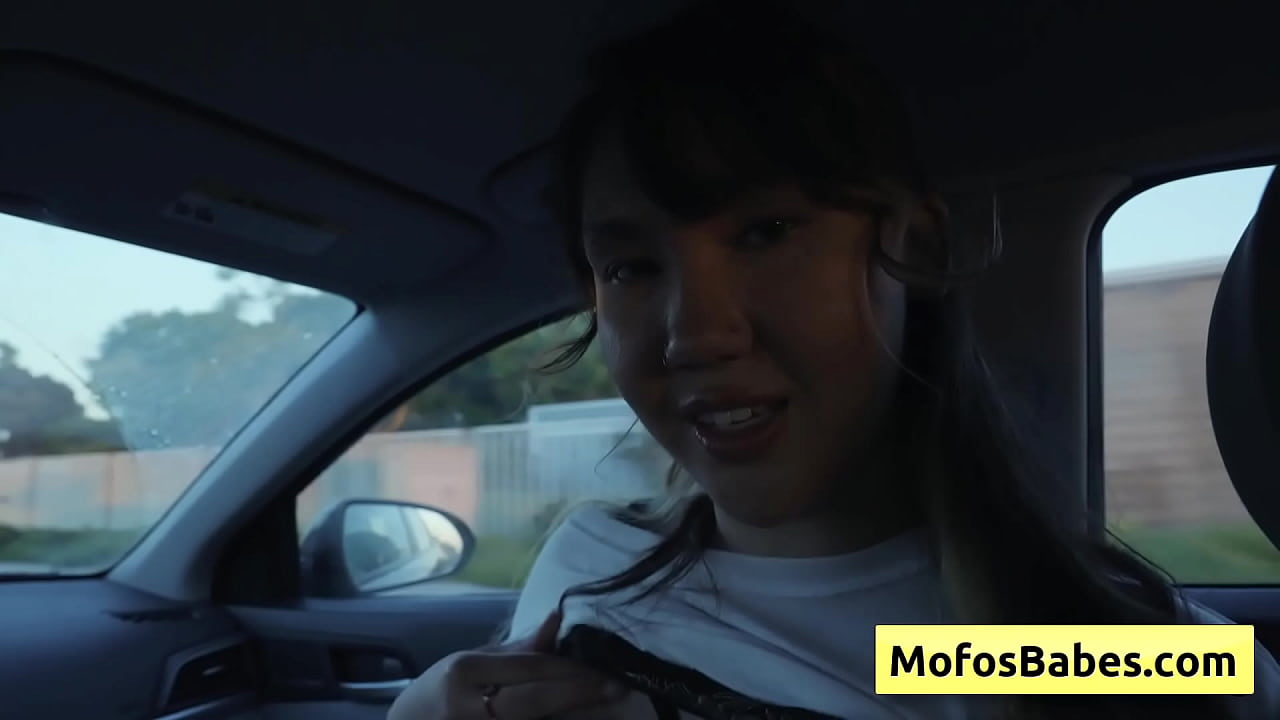 Sexy and beautiful asian teenager massage her big tits in the car in front of her friend