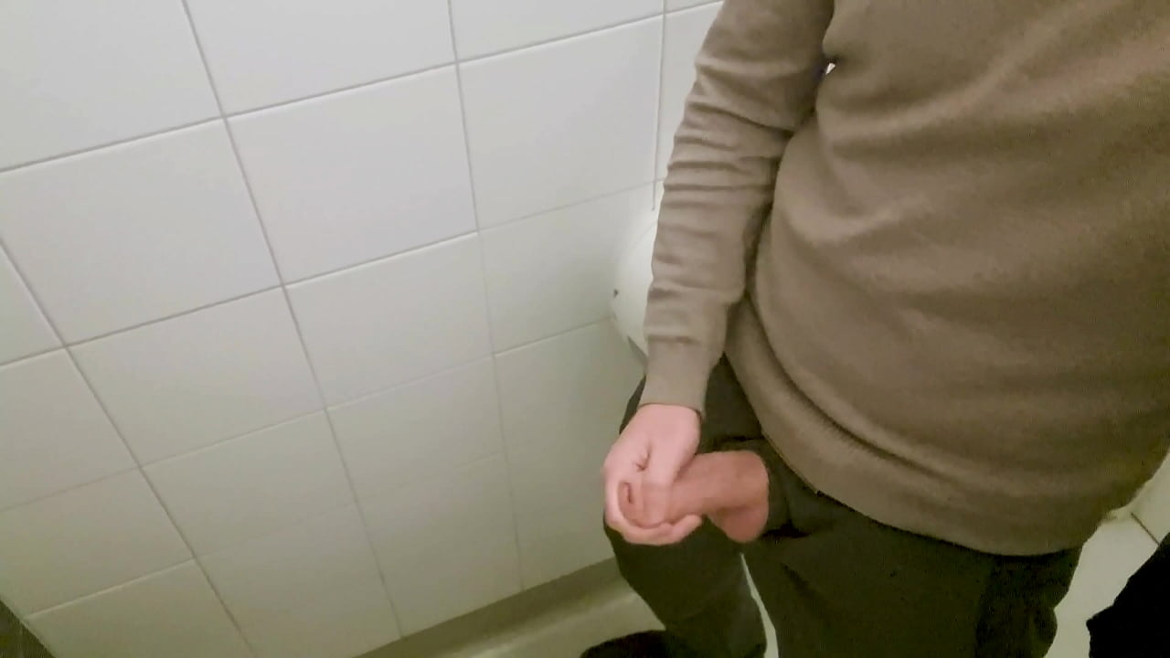 Wanking in IKEA restroom with a queue of people outside.