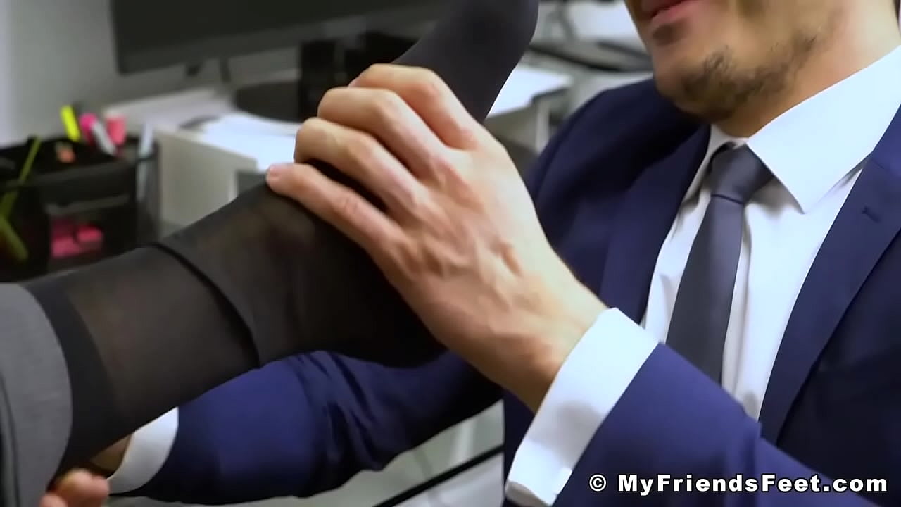 Men in suits smelling feet and toes