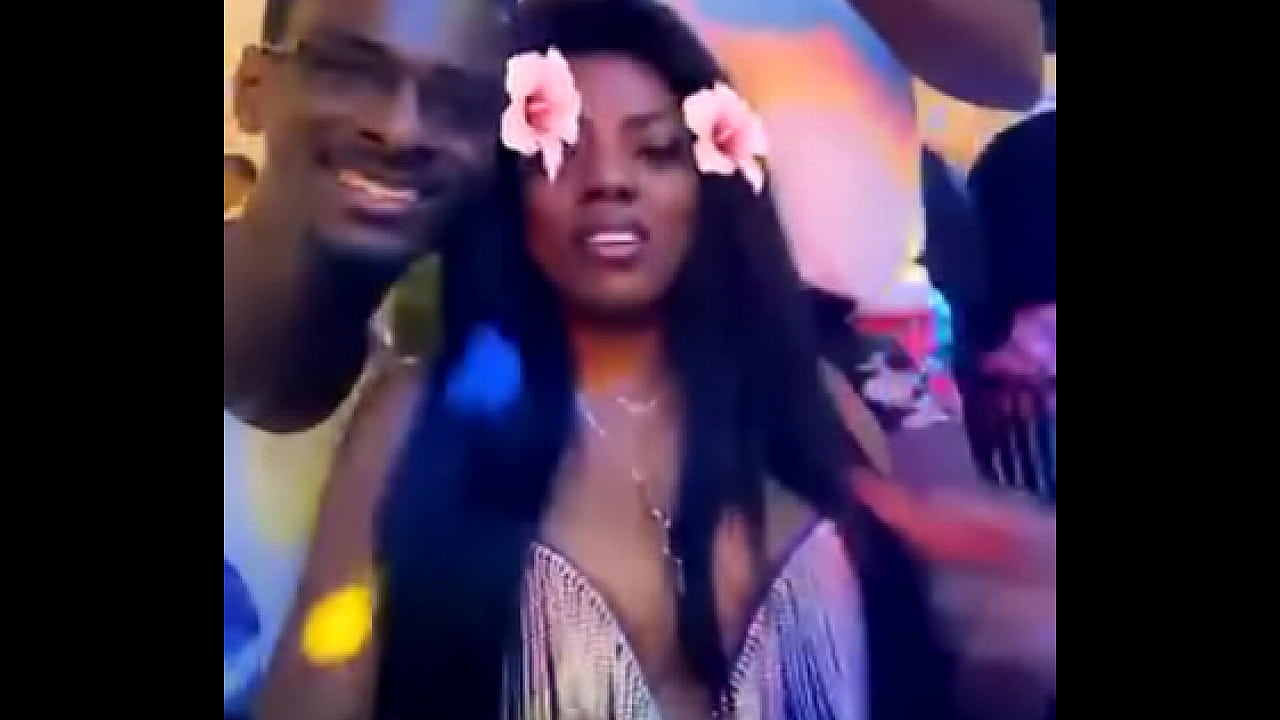 Nana Aba teases sexy tits in party