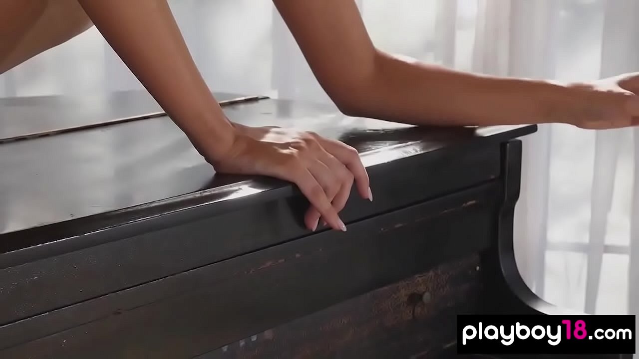 Classy blonde pianist presents her music and perfect body