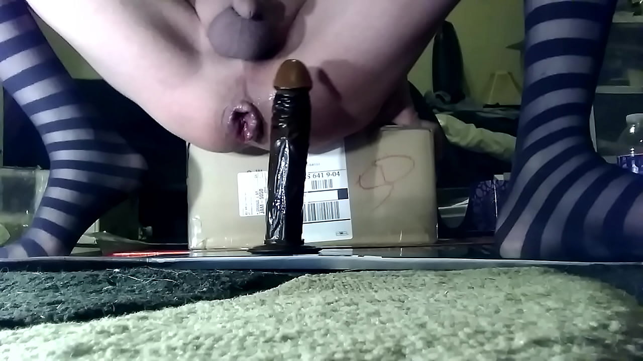 Taking all 9 inches of black dildo