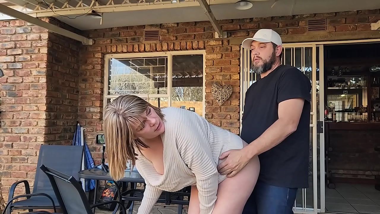 Fucking his wife on the patio