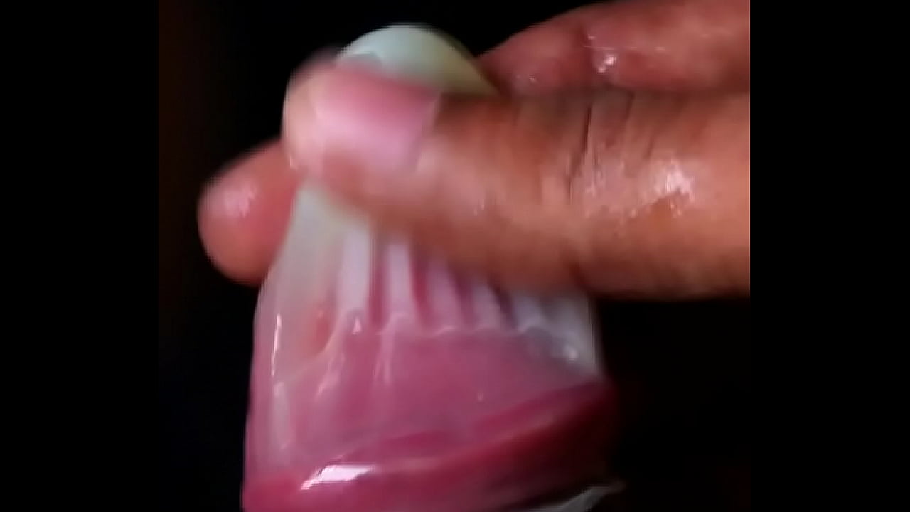 Cumshot inside a condom