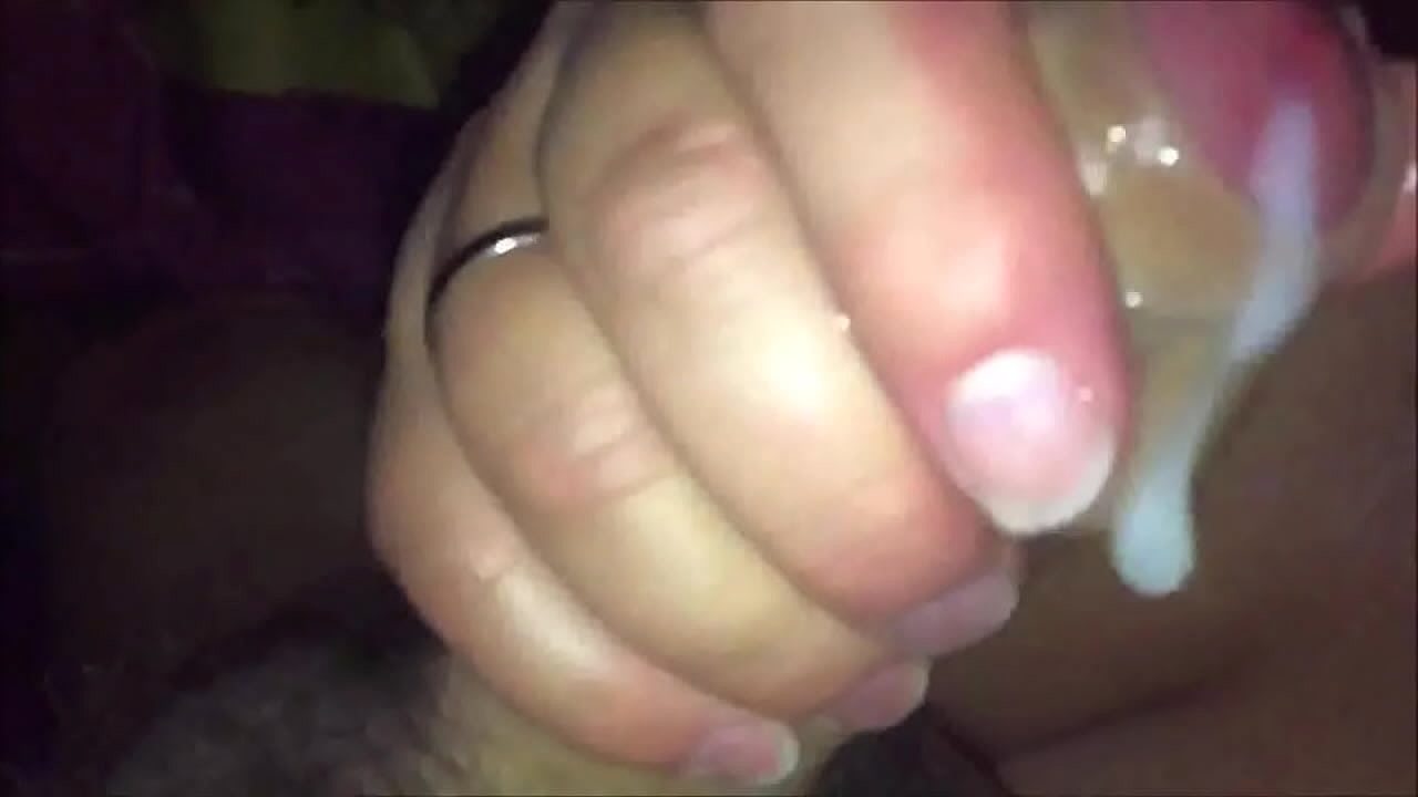 She makes him release his cum with her hands