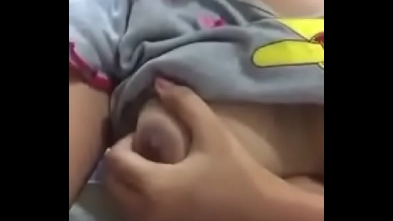 girl self satisfying by pressing boobs