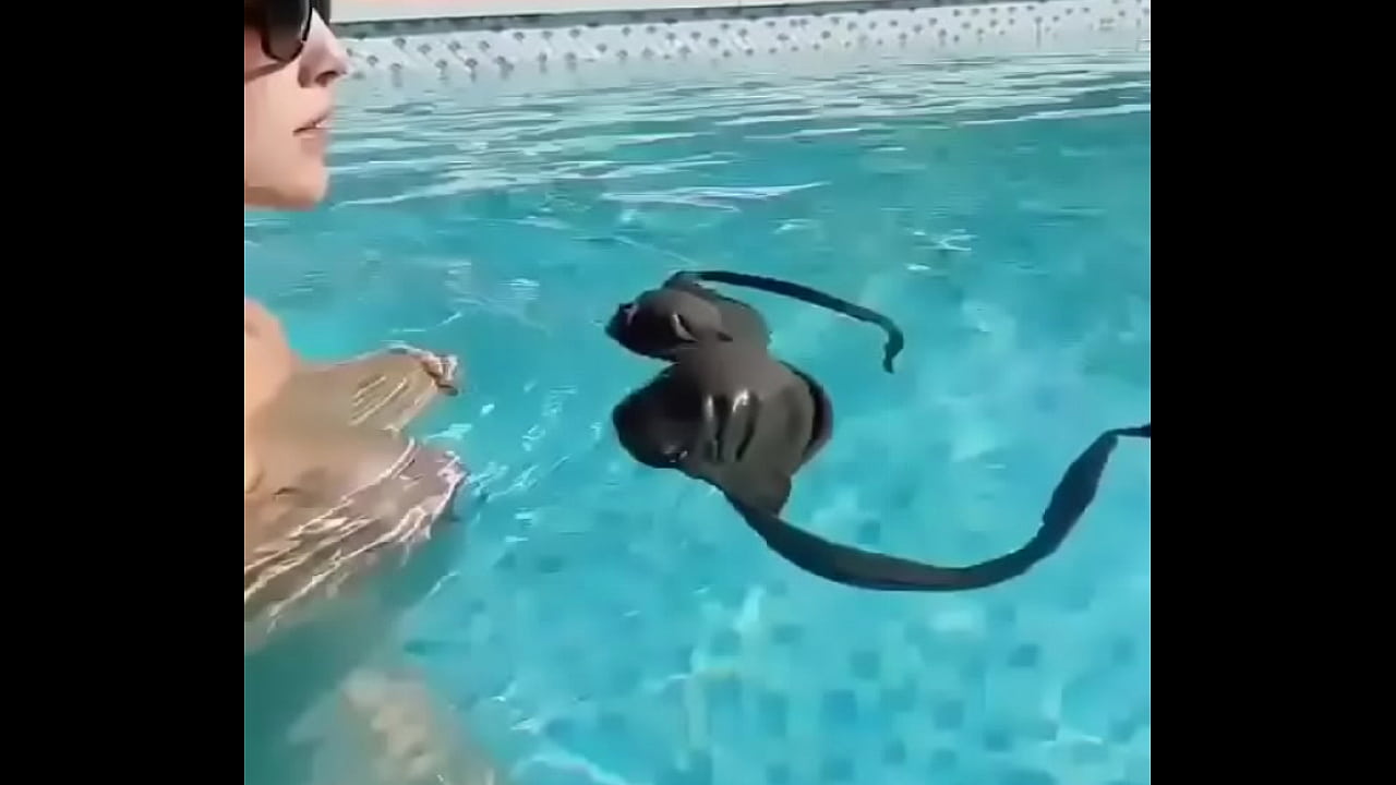 Amanda Cerny in the pool showing tits