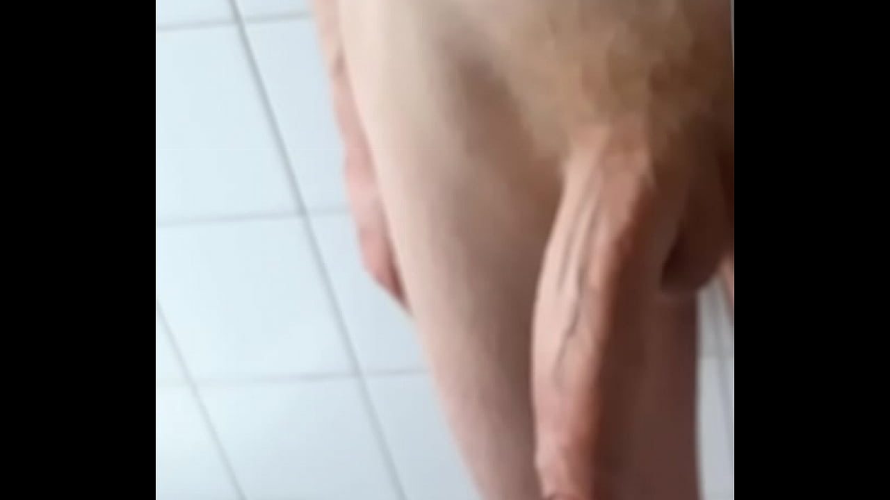 Twink with a big uncut cock jerking off