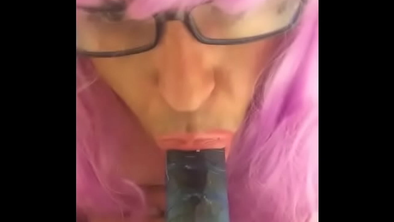 Sissy Bambi Jones practices oral on black fake cock