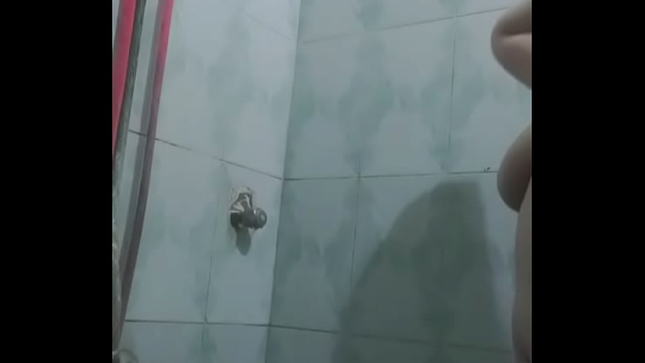 An Egyptian girl taking a shower