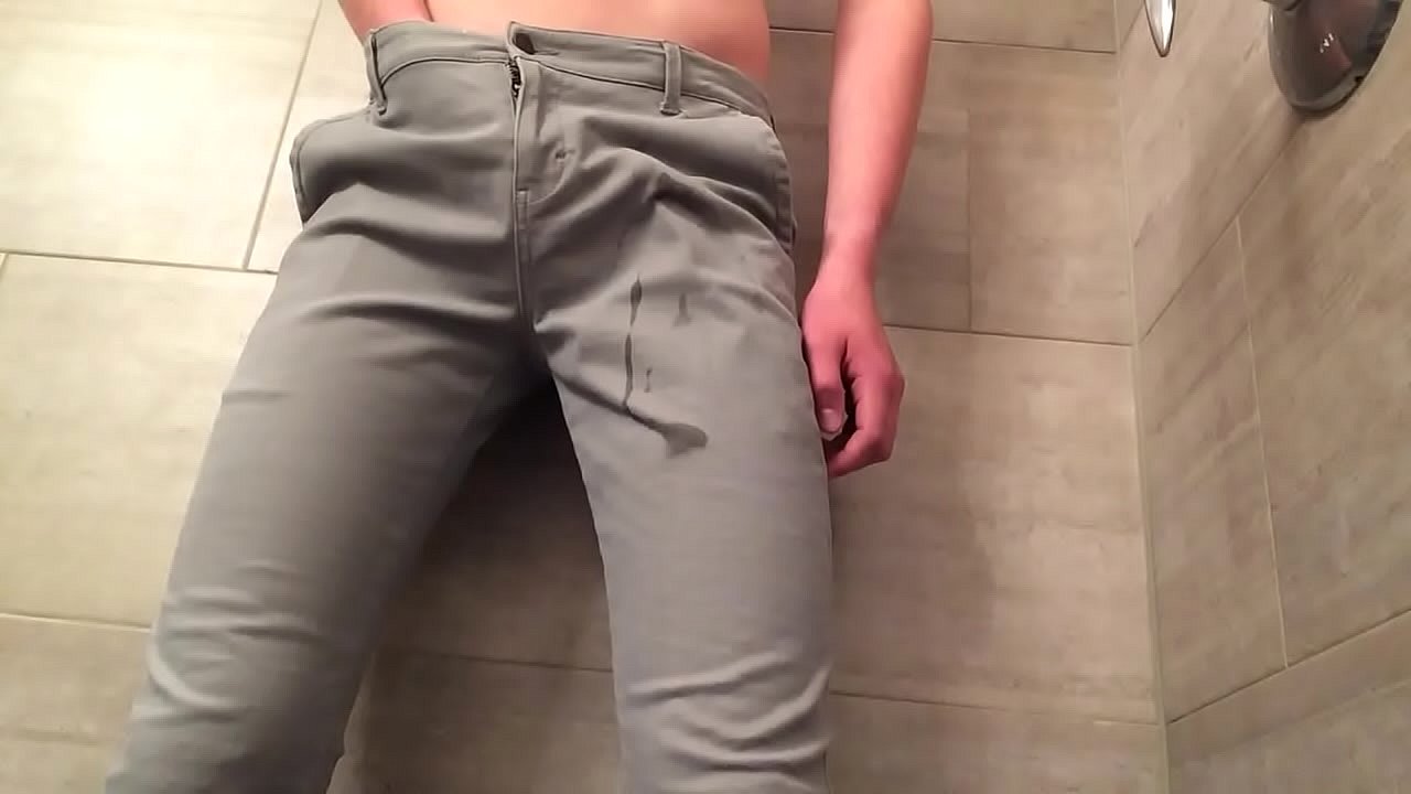 Young man pisses on himself then cums