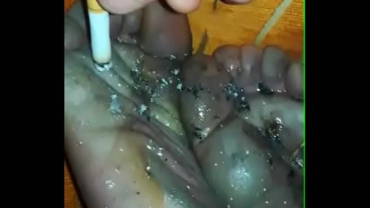 Slutboy makes an ashtray from the feet