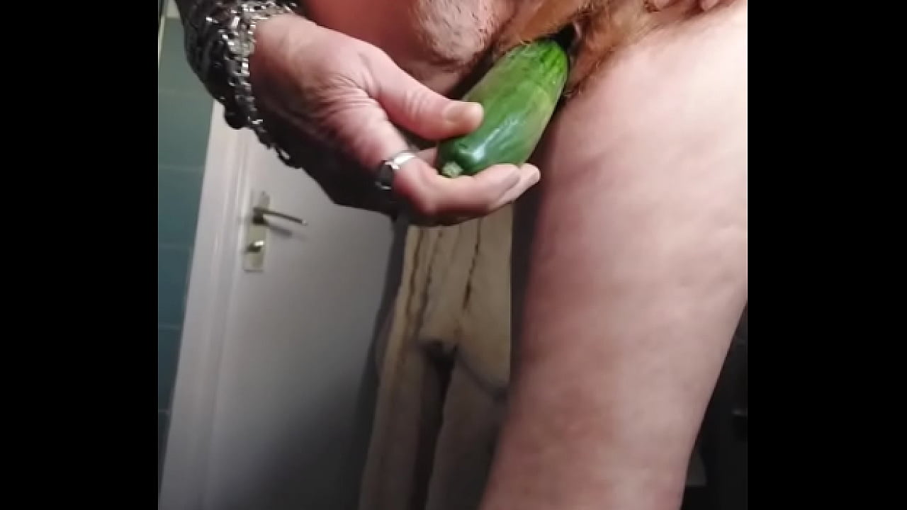 Granny fucks hairy pussy with cucumber