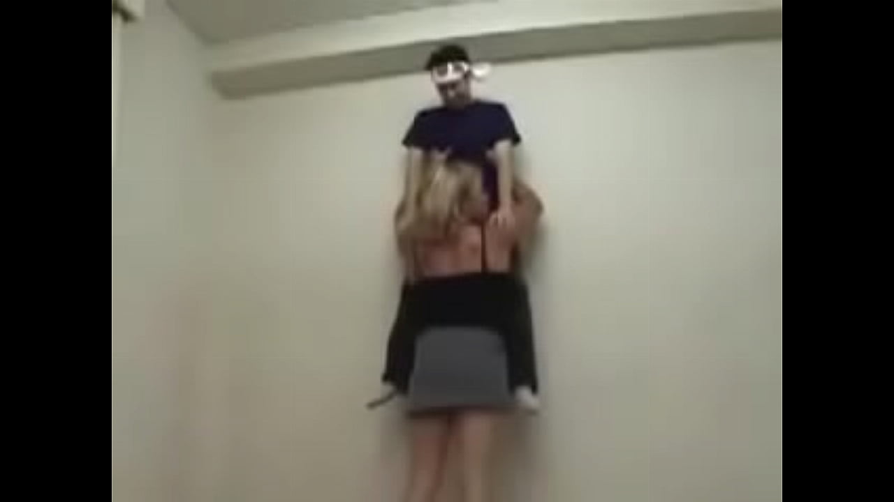 perfect tall women lift by waist against the wall