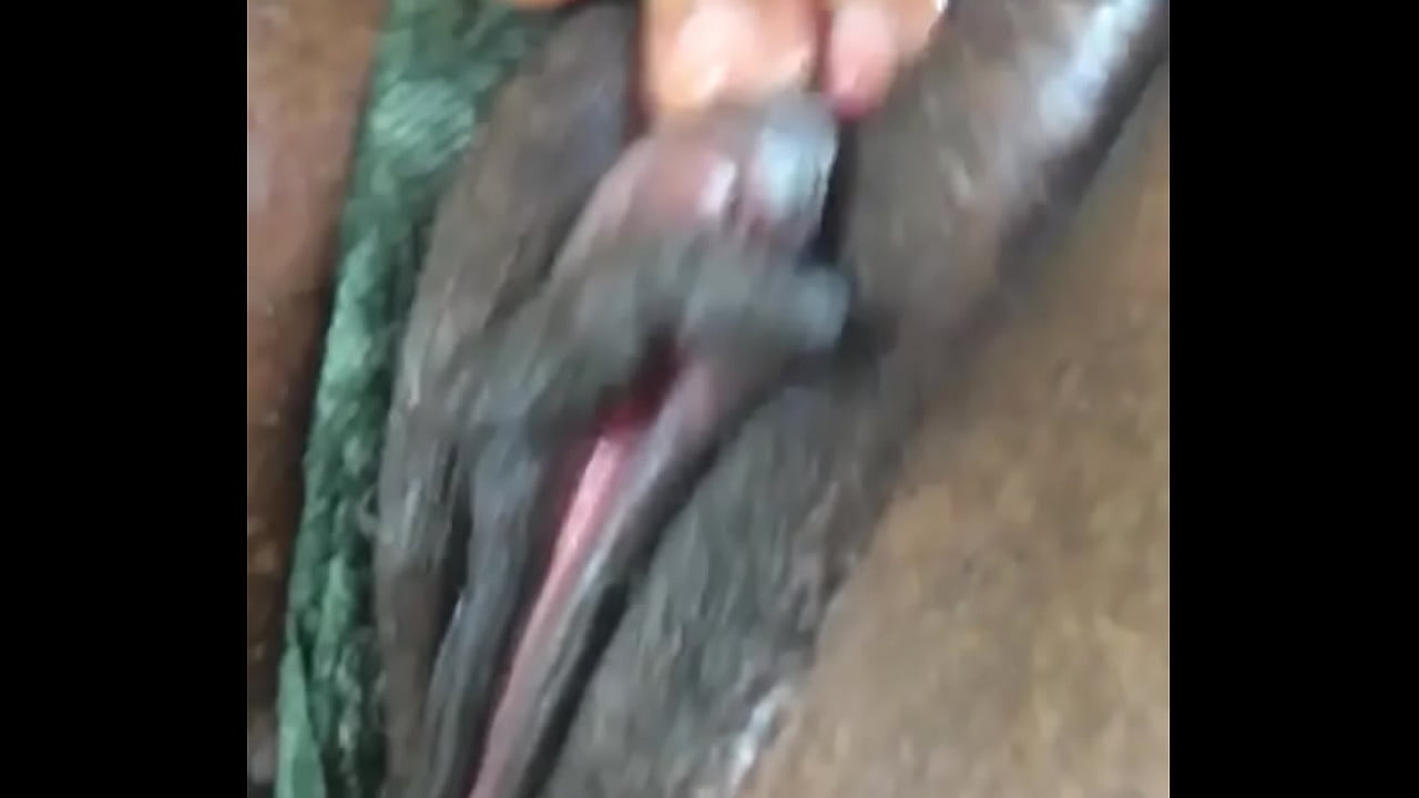Horny Slut fingering her plump pussy