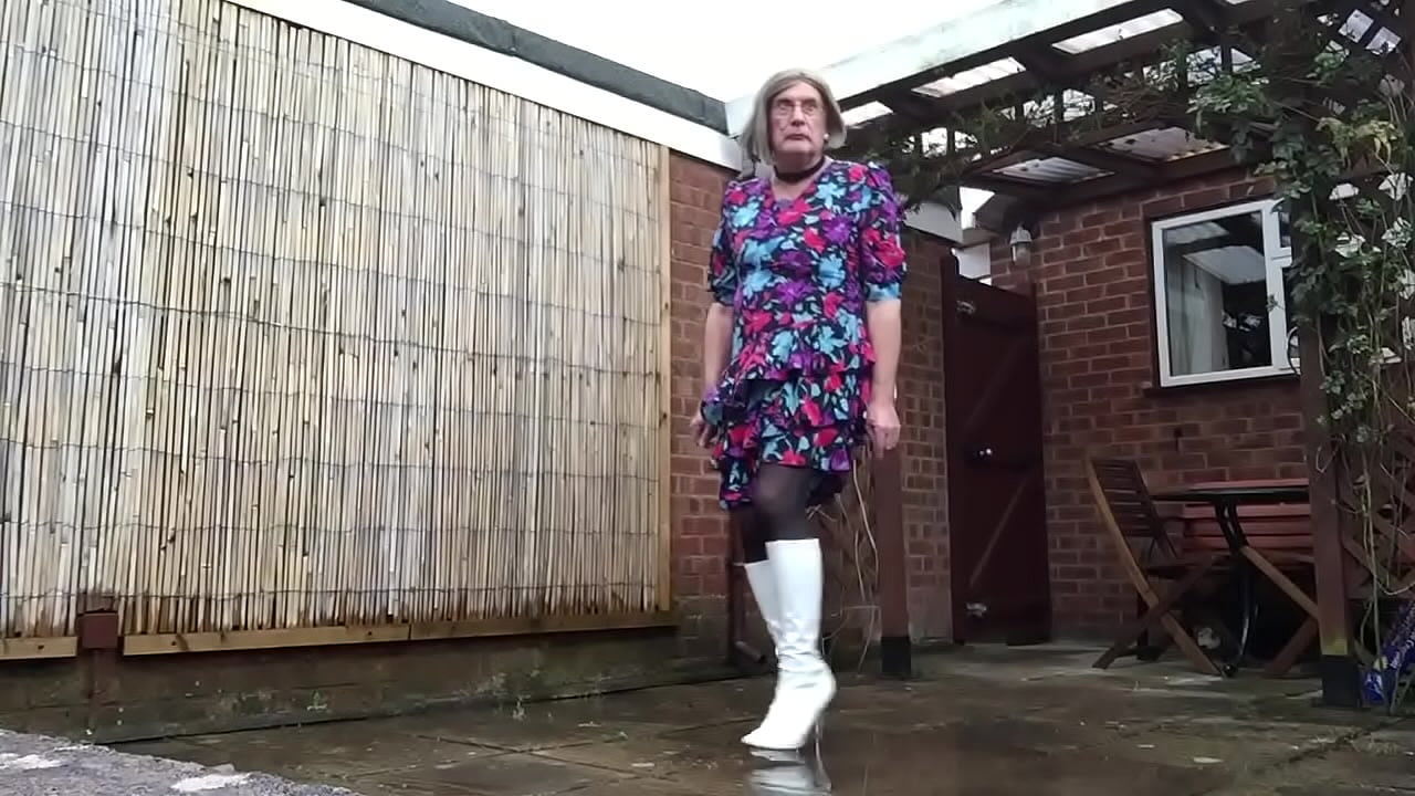 Crossdresser Exposed outdoors in white boots