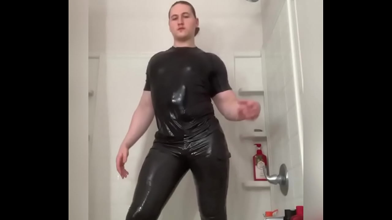 Hunk in skintight trousers gets soaked