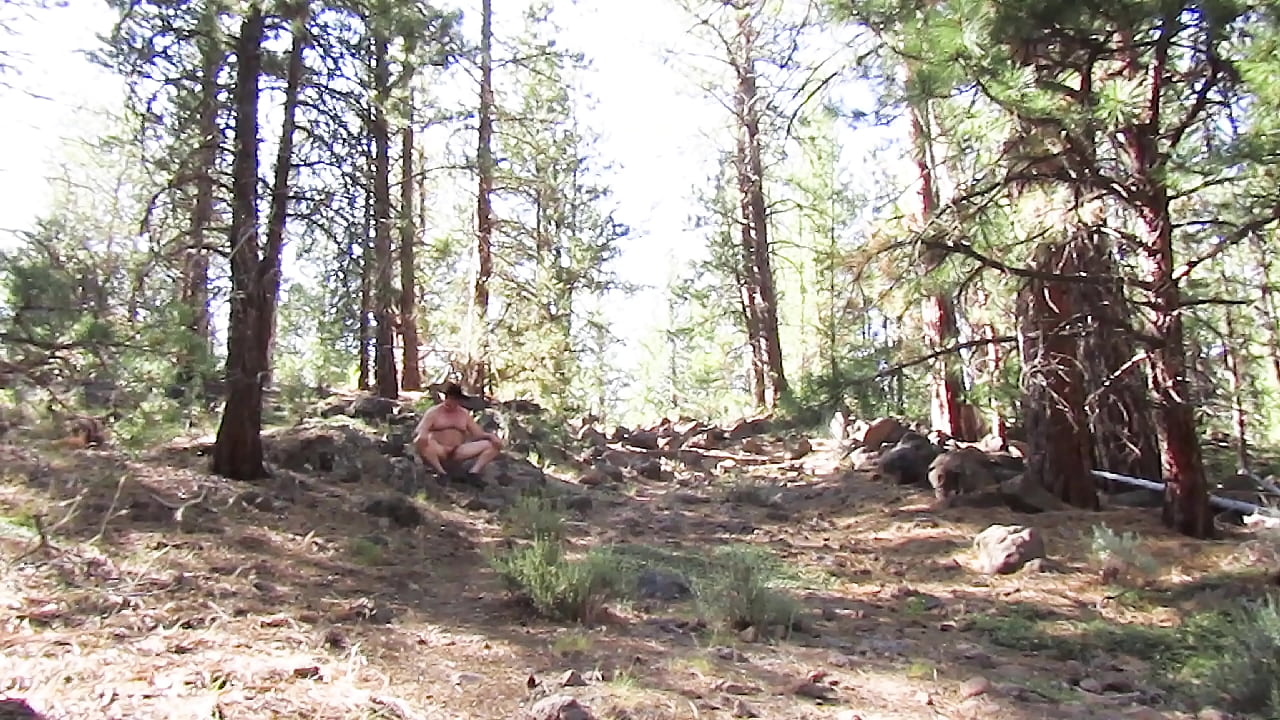 Naked climb and sitting hard on a rock.