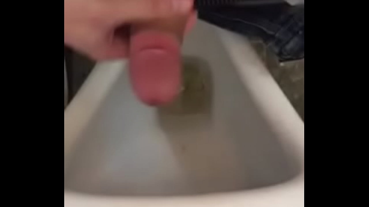 nice cum shot after stroking in public bathroom