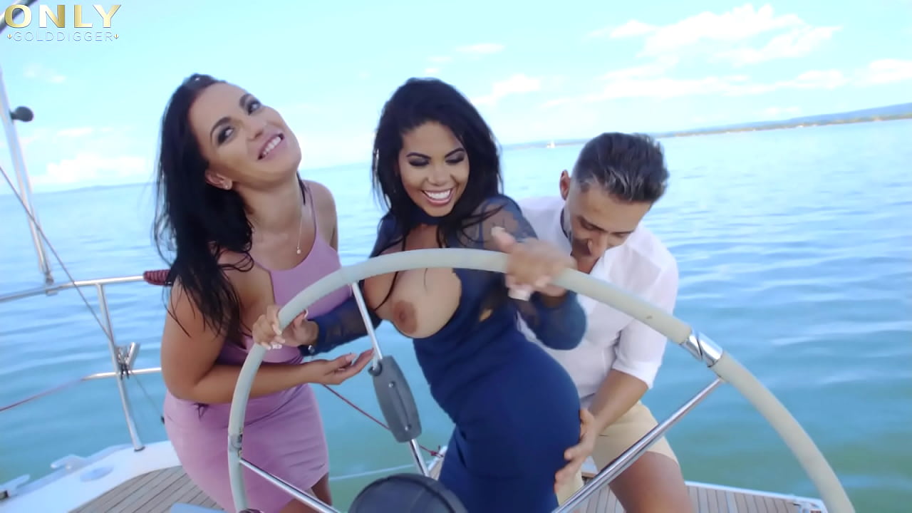 Busty Honey Demon and Kesha Ortega awesome threesome in the boat