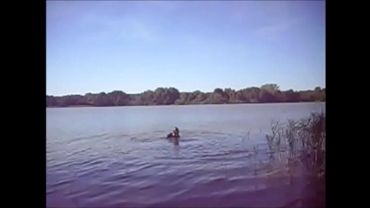 Outdoor bathing in a PVC suit