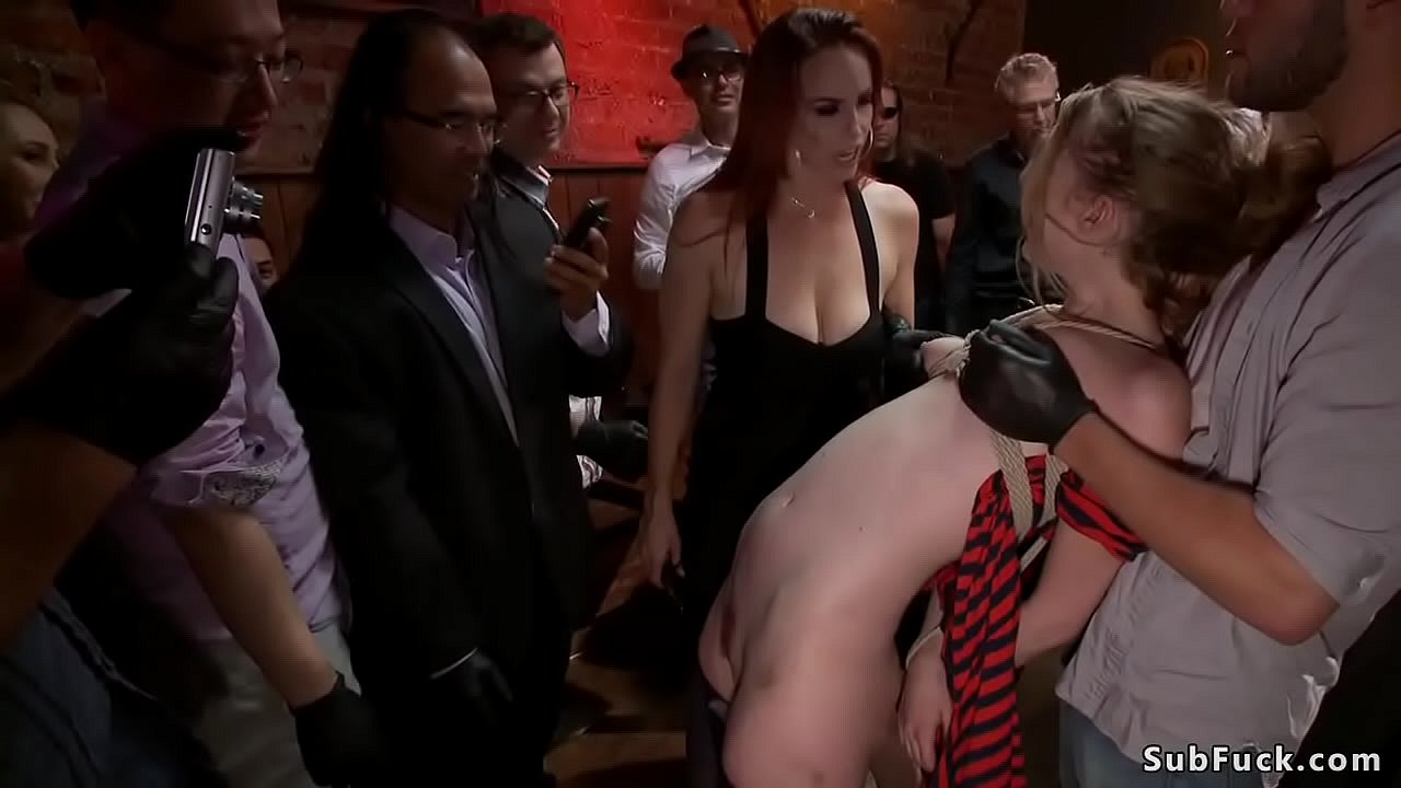 Mistress Bella Rossi drags tied up hottie Ela Darling in public bar and there makes her deep throat suck and rough fuck till gets cumshot for crowd