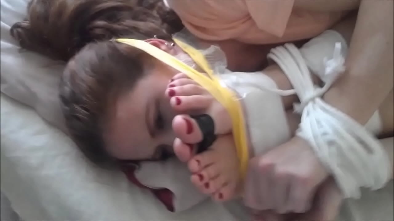 Whitney Morgan & Shauna Ryanne are gagged and feet tied to face.WMV