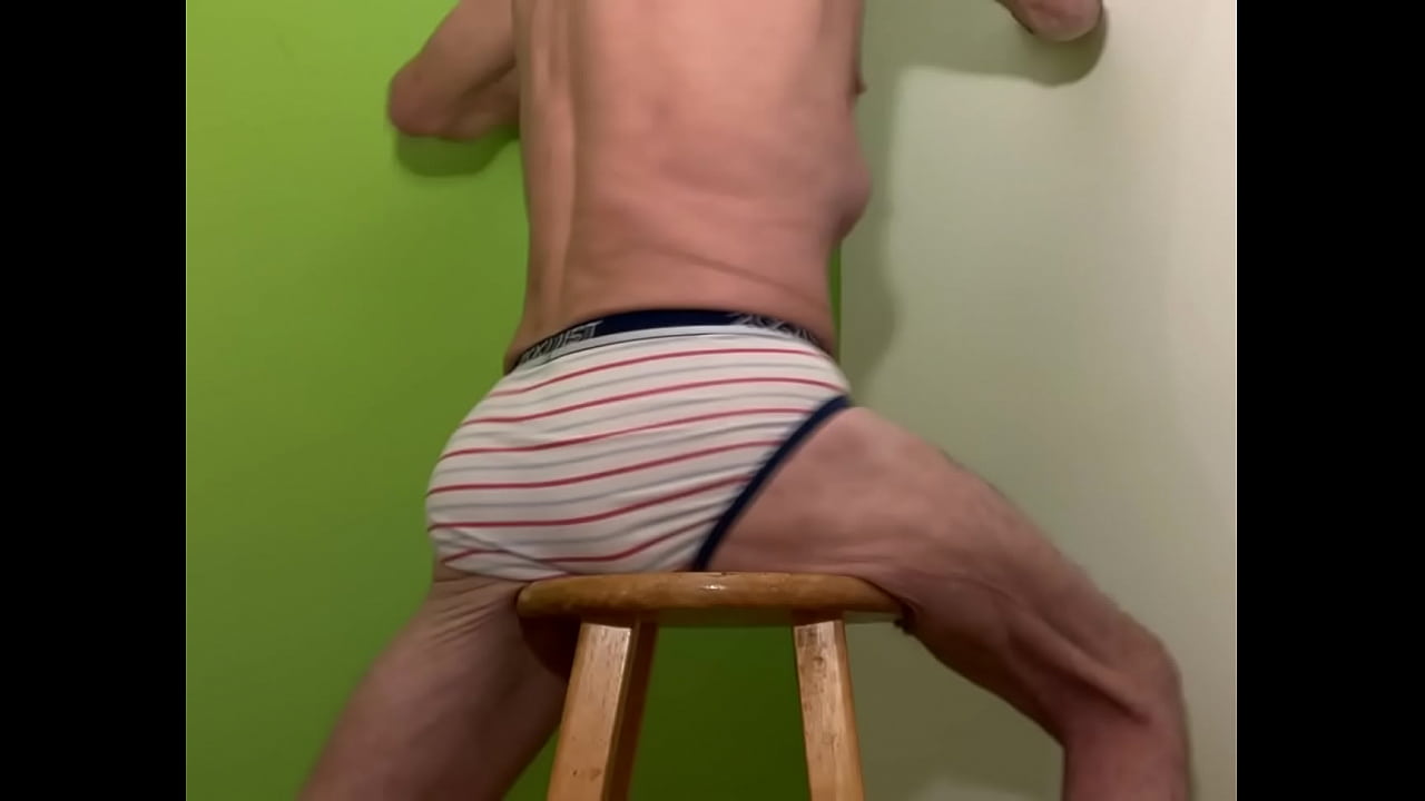 Striped Underwear male deep pubic mayofascial release on Stool