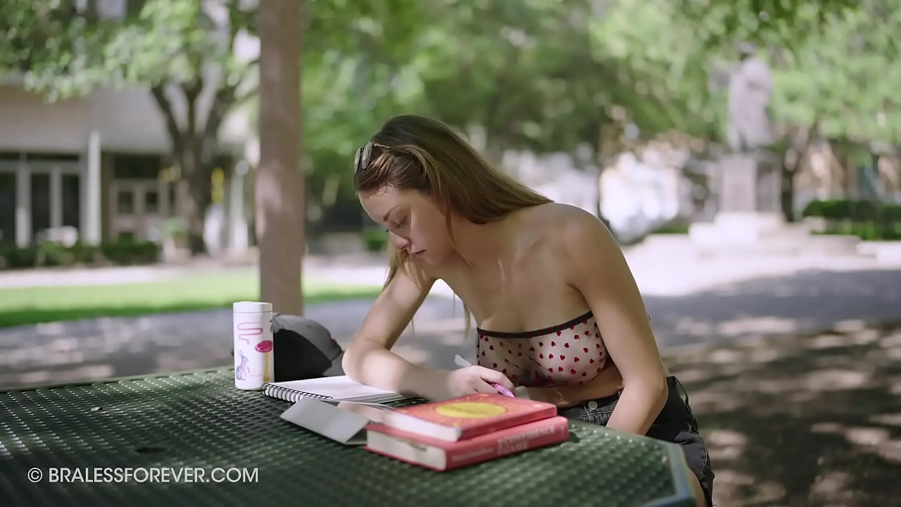 Big tits showing on a public bench outdoors