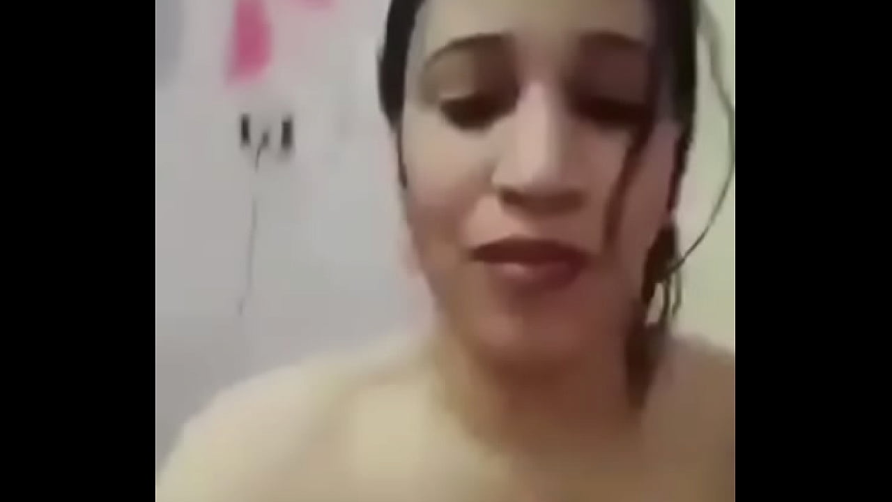 An Egyptian girl completely naked in her bedroom