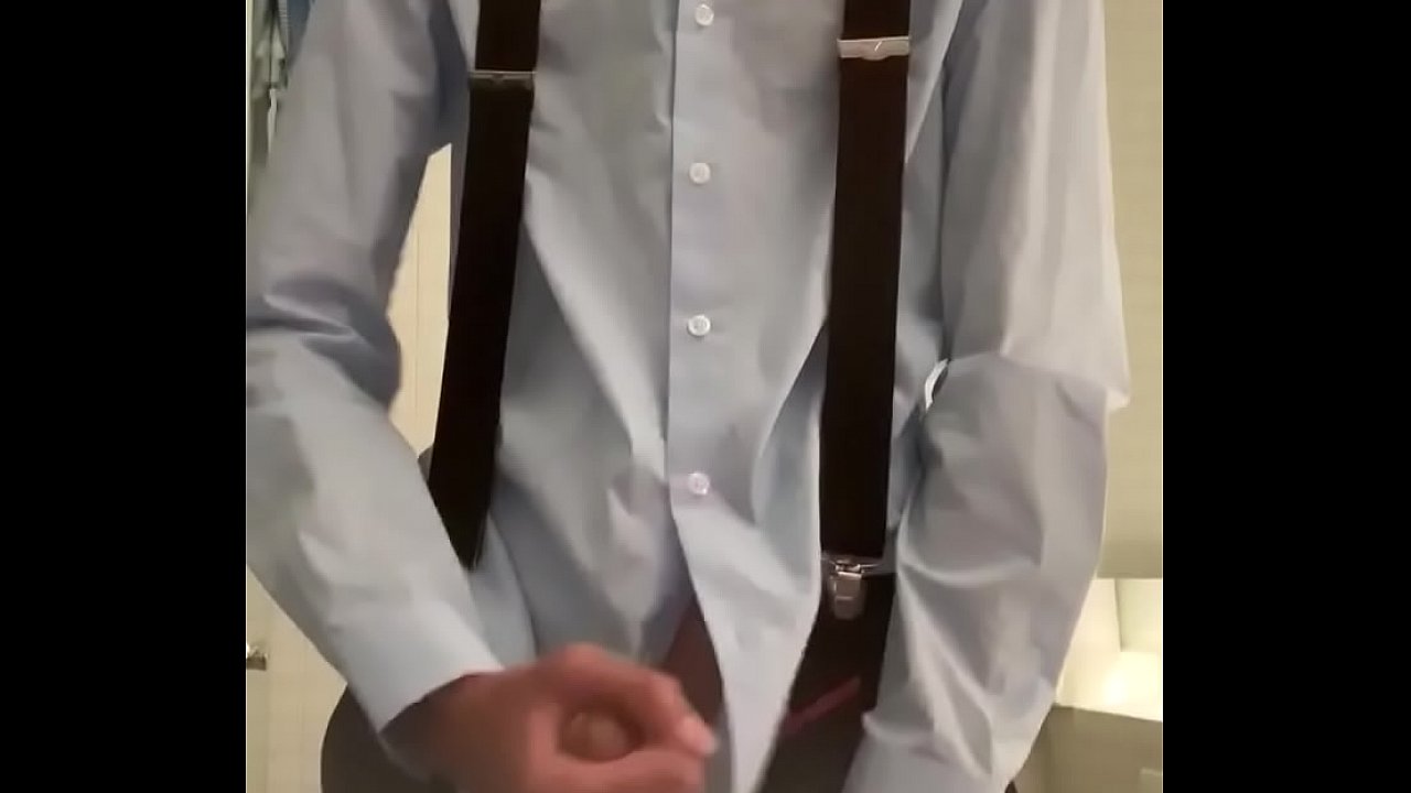 Boy masturbating in blue dress shirt and suspenders