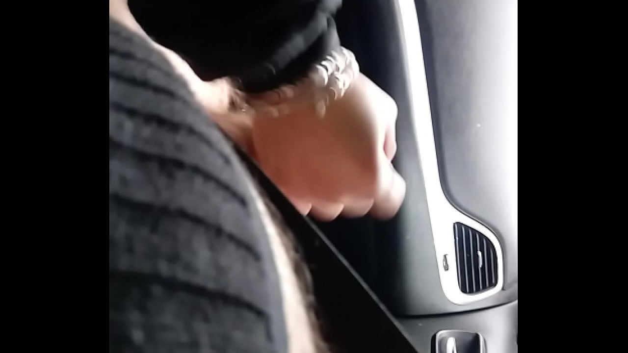 Chubby wife gives handjob while driving