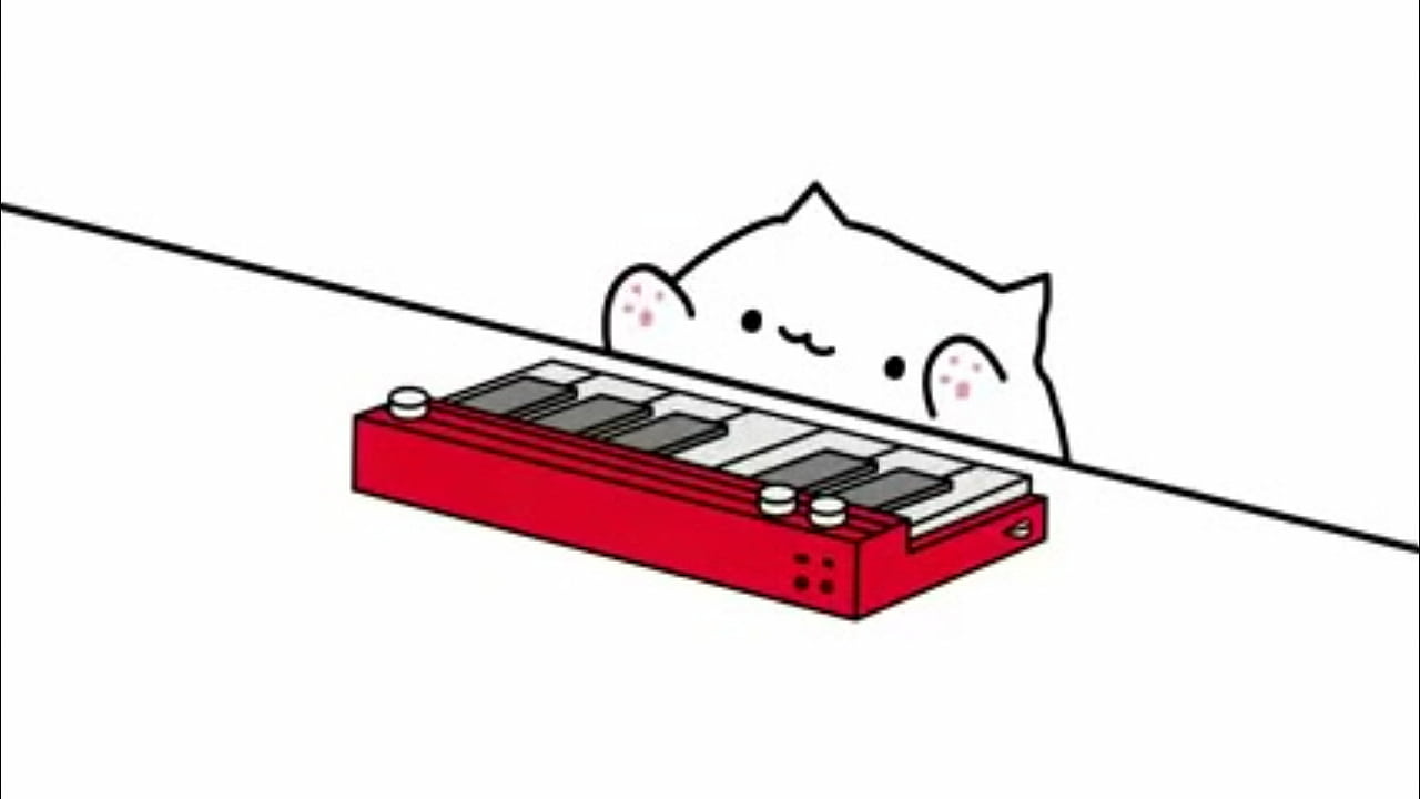 Gatinho siriricando piano de brinquedo