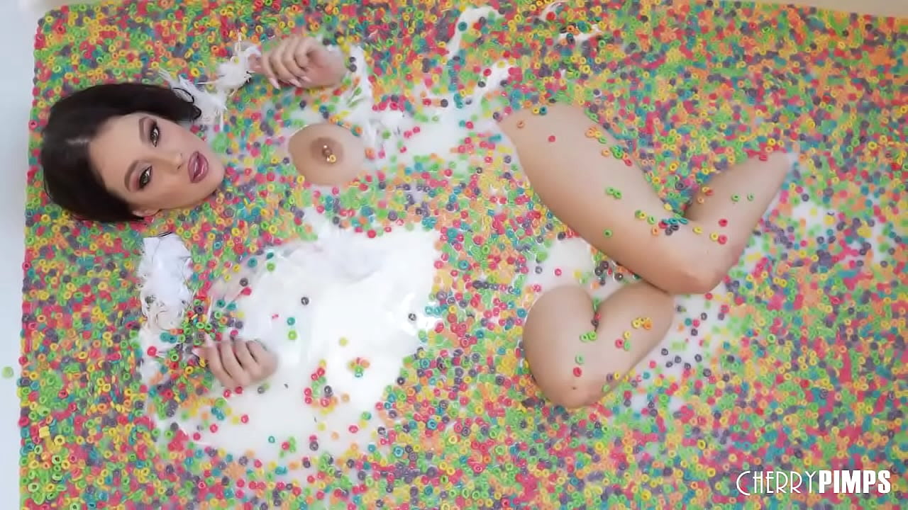 This solo scene with Cherry of the Month Maddy May is playful and fun as she rolls around in a tub of cereal. You'll want to eat her up while she plays with her big tits.