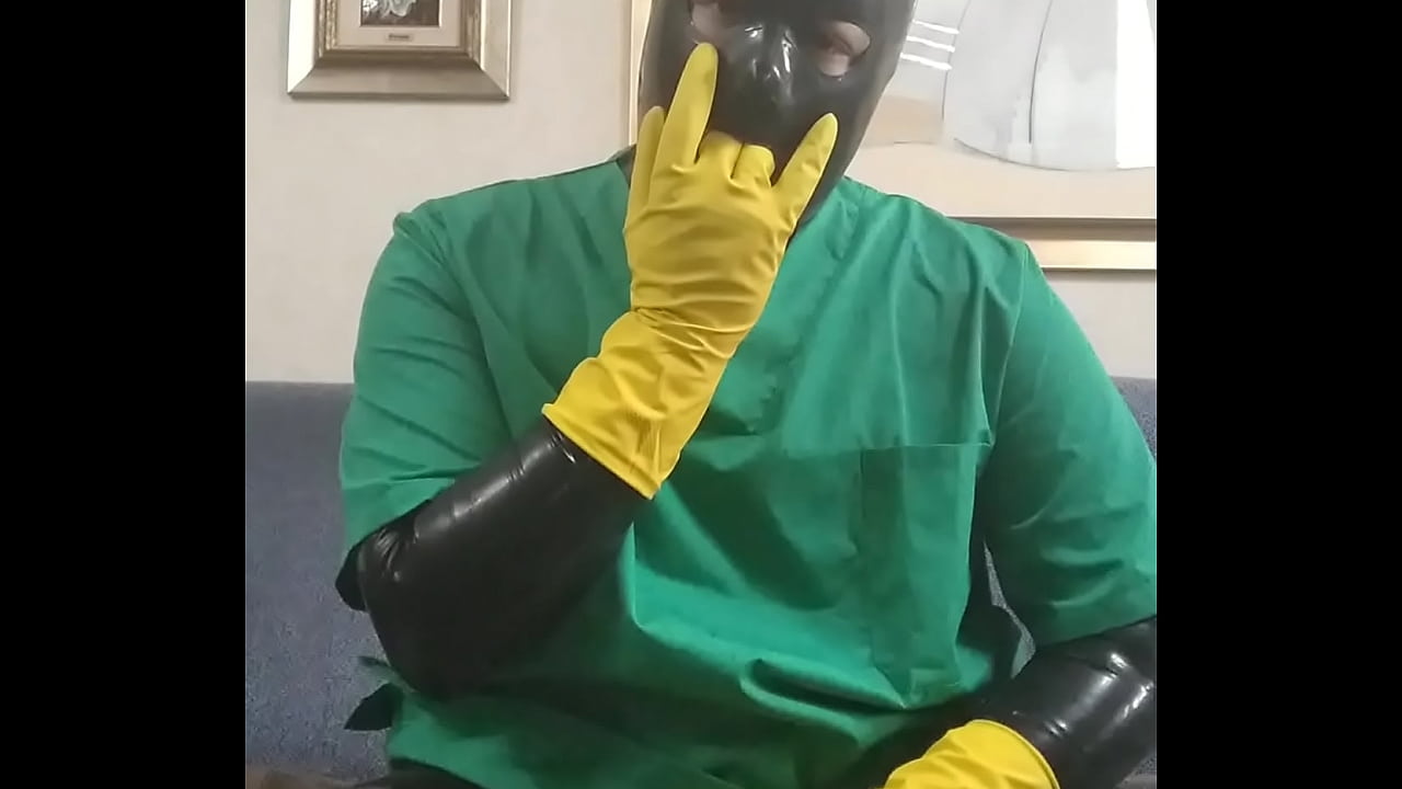 Rubber surgeon masturbating