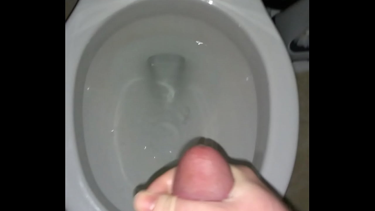 Asian twink unloads his balls in the toilet