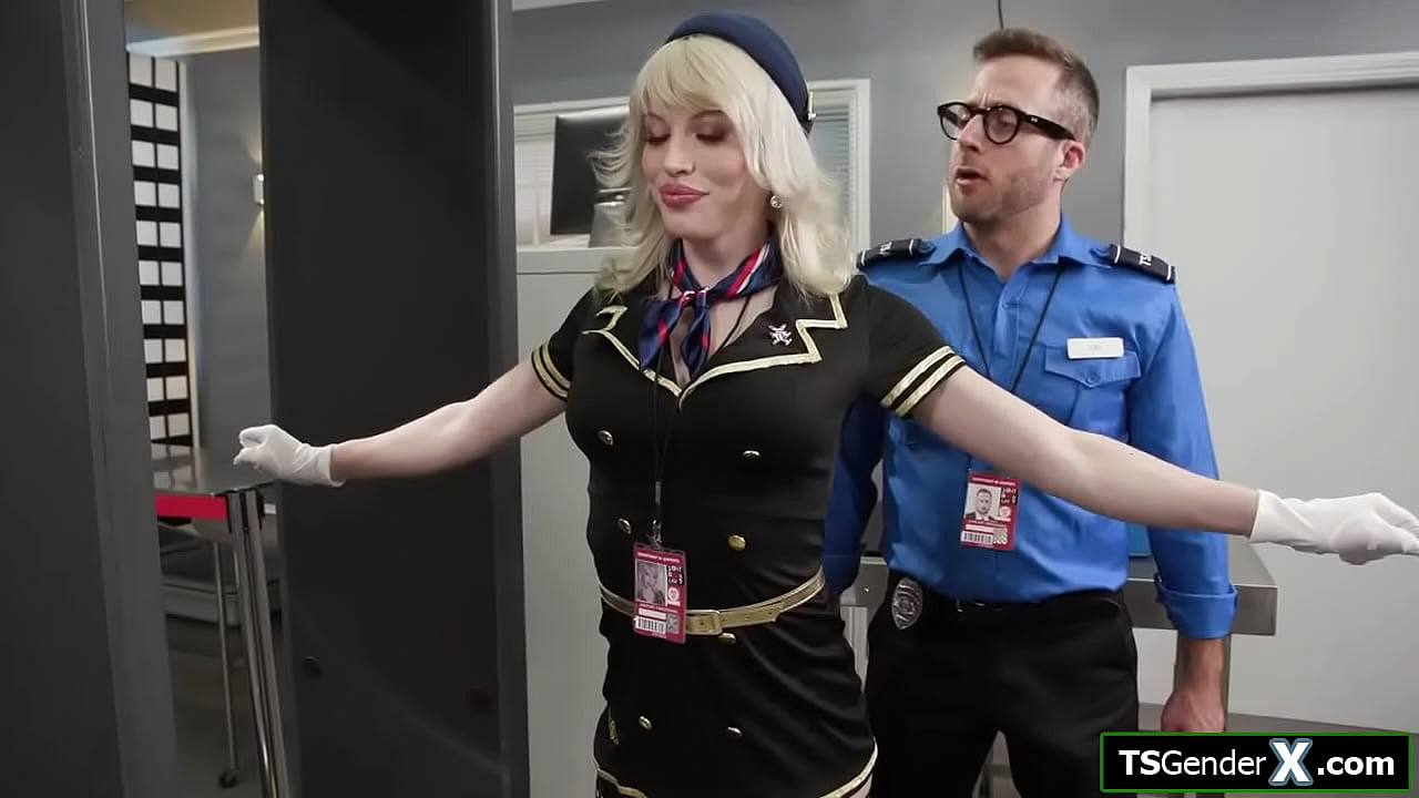 Trans flight attendant Izzy Wilde has a toy up her ass and security guy pulls it out.The big tits tgirl sucks cock and is ass fingered.Shes barebacked