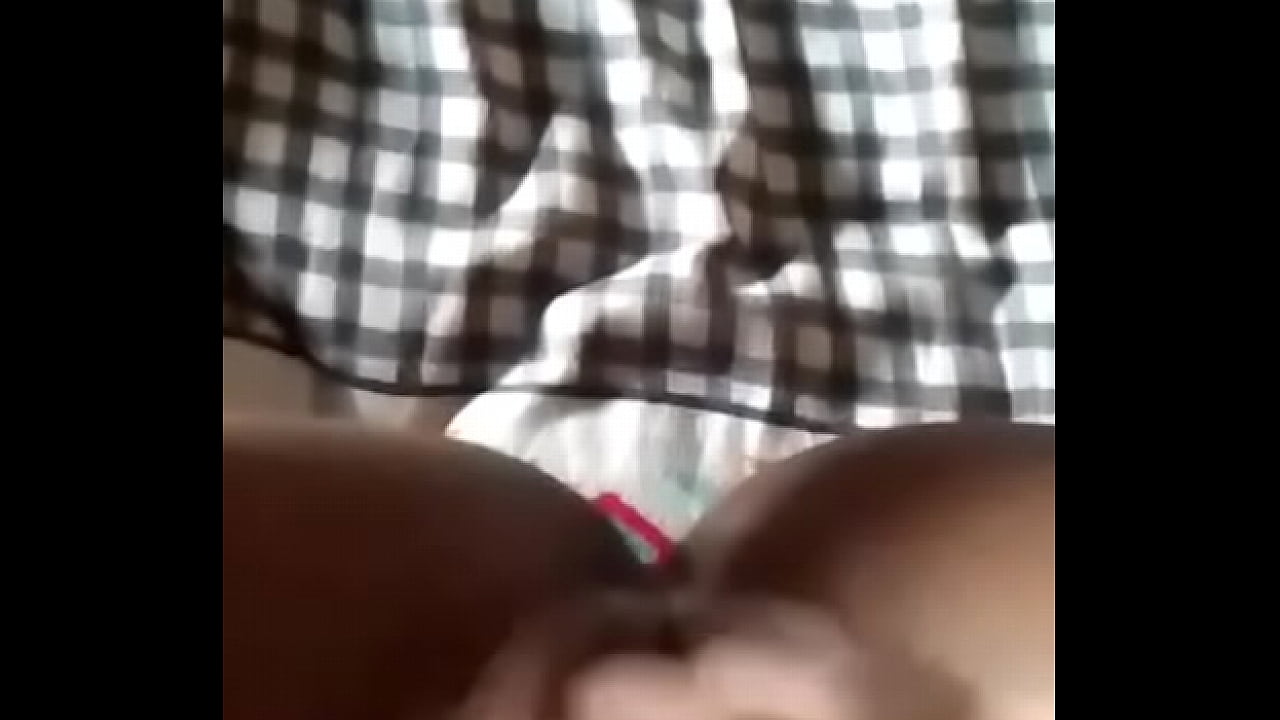 Teen fingers her wet pussy