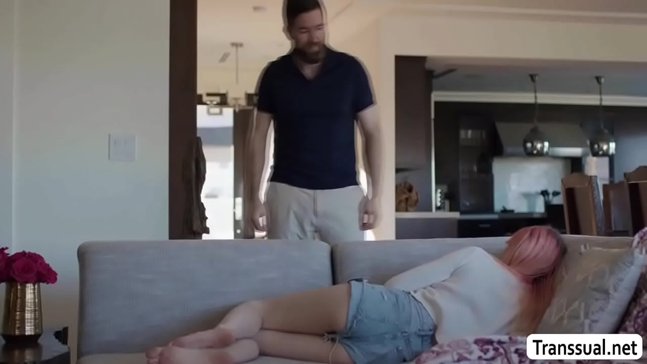 Stepdaddy Chris Epic and his busty TS stepdaughter Mimi Oh are on the couch kissing each other so hard