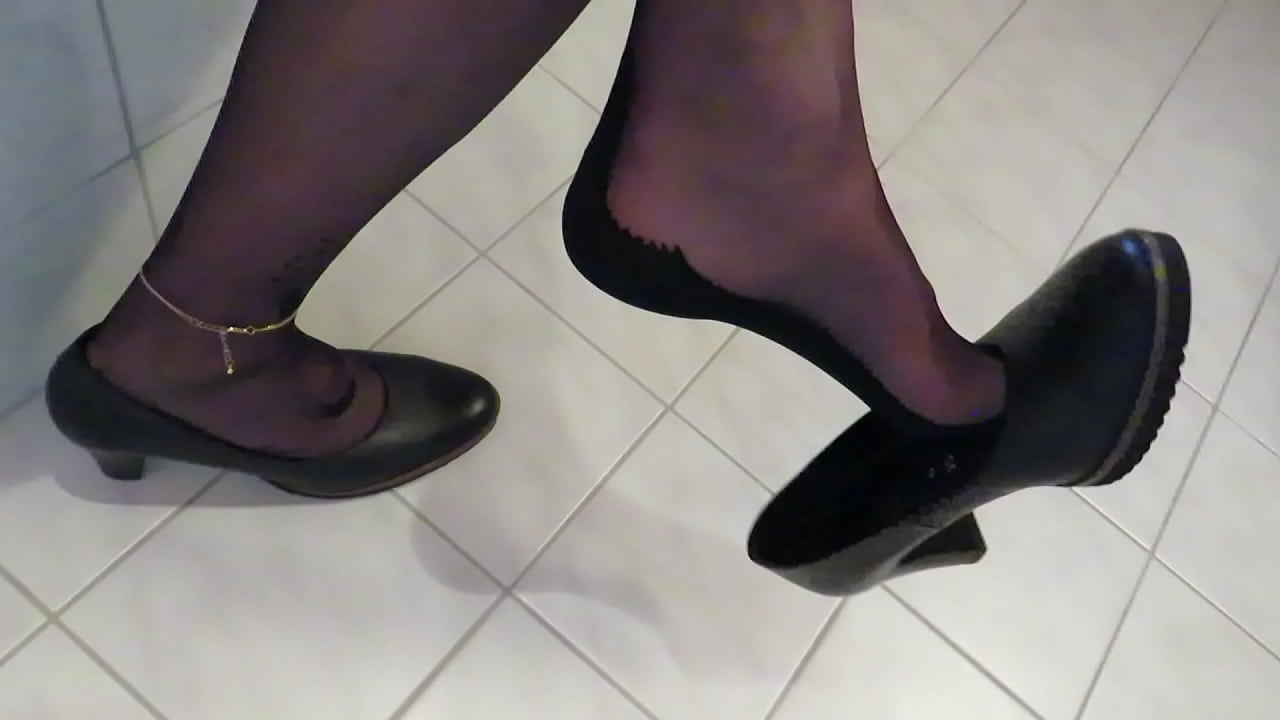 French Queen of shoeplay loves to dangle her "GABOR" high heels