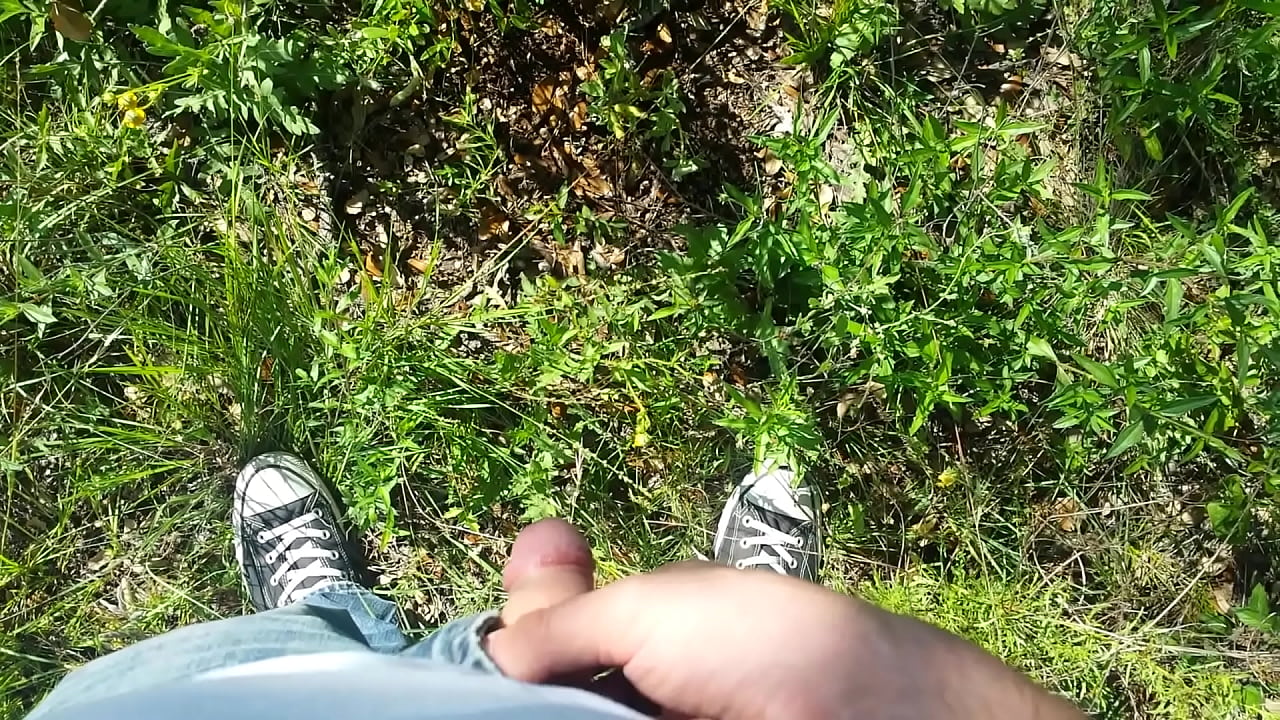 Pissing outdoors on a sunny day