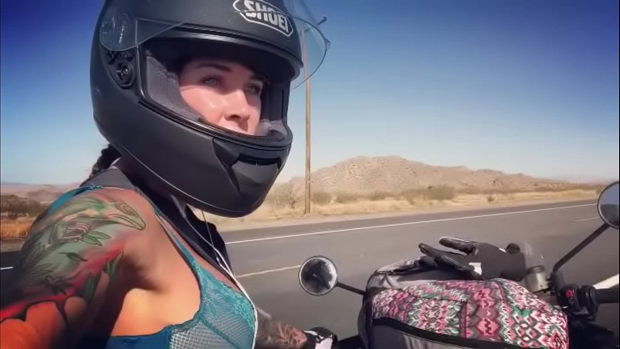 side boob moto chick felicity rides bike